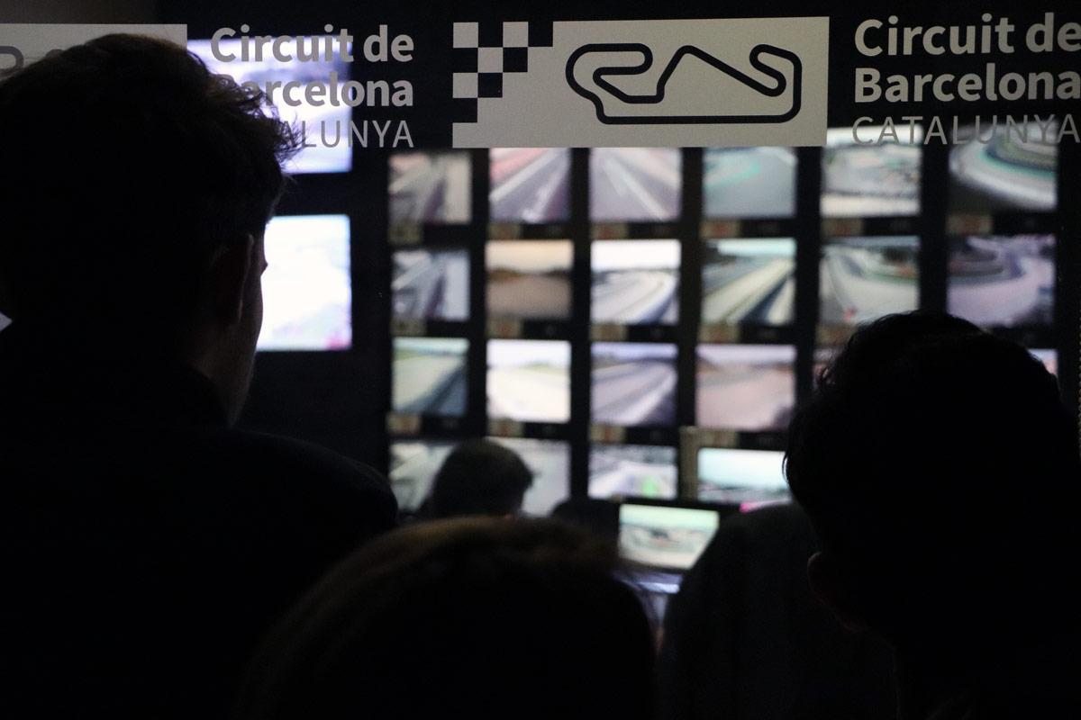 Johan Cruyff Institute students in media control room at the Circuit de Barcelona.